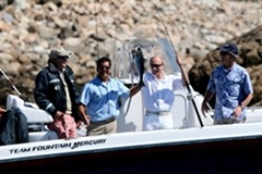 Putin holding a Striped Bass