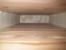 Cedar barriers between drawers prevent the bugs from spreading