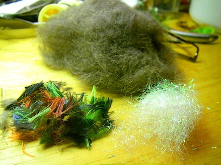 A pile of polyamide scrap, some Angelina fiber and the base blend, ready for special effects
