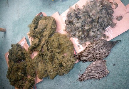 Two packs of RIT and three batchs of feathers